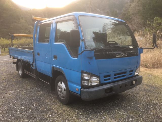 中古車 いすゞ エルフ 7人乗り 6速mtインジェクター交換渡し の中古車詳細 260 867km ブルー 静岡県 79 8万円 中古車情報 中古車検索なら 車選びドットコム 車選び Com