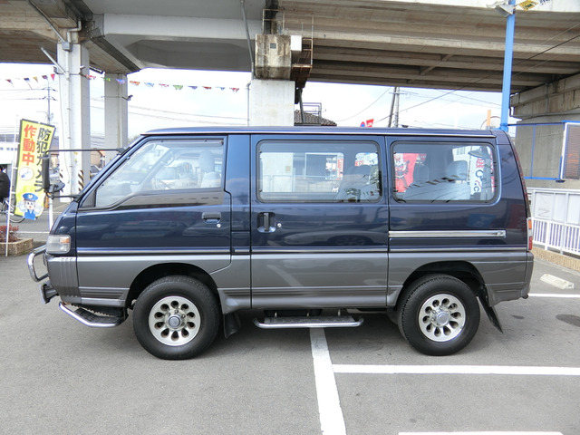 中古車 三菱 デリカスターワゴン 2 5 エクシード リミテッドエディション ハイルーフ ディーゼル 4wd 純正15aw フロントグリルガード の 中古車詳細 76 000km ダークブルー 岡山県 177万円 中古車情報 中古車検索なら 車選びドットコム 車選び Com