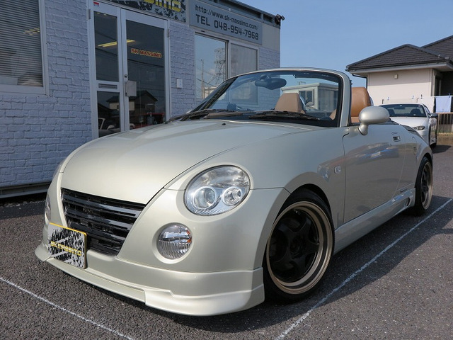 中古車 ダイハツ コペン タンレザーエディション エアロ ナビ地デジtv車高調15aw の中古車詳細 34 080km シャンパンメタオパール T17 埼玉県 Sold Out 中古車情報 中古車検索なら 車選びドットコム 車選び Com