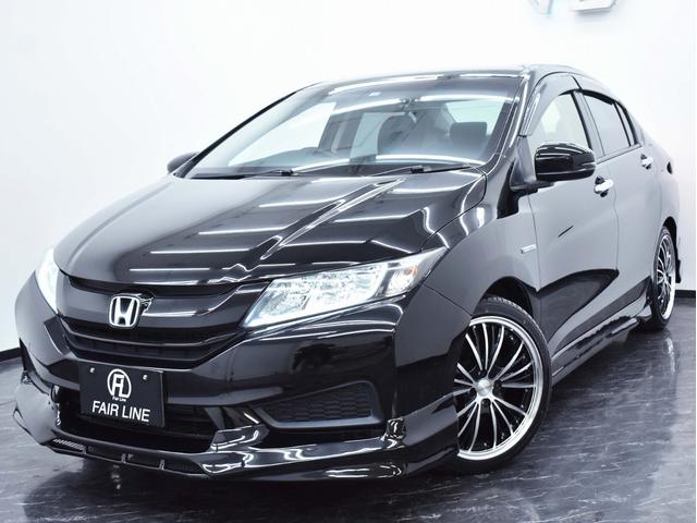 中古車 ホンダ グレイス 1 5 ハイブリッド Lx 特別1年保証付車 走行無制限 の中古車詳細 25 000km ブラック 神奈川県 118万円 中古車情報 中古車検索なら 車選びドットコム 車選び Com
