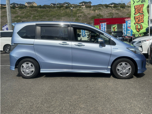 中古車 ホンダ フリードハイブリッド 1 5 ジャストセレクション 禁煙車 後席モニター 両側自動ドア の中古車詳細 44 280km ブルー 宮城県 99 9万円 中古車情報 中古車検索なら 車選びドットコム 車選び Com