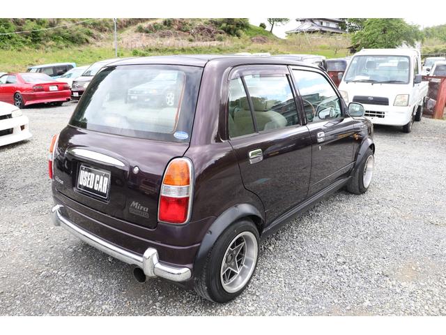 中古車 ダイハツ ミラジーノ 5速マニュアル 社外オーバーフェンダー 13インチ旧車風ホイール の中古車詳細 93 000km パープル 福島県 41 8万円 中古車情報 中古車検索なら 車選びドットコム 車選び Com