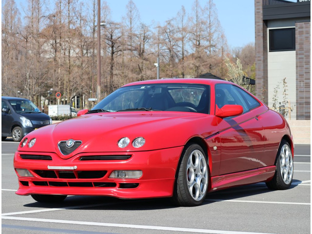 中古車 アルファロメオ アルファGTV 3.0 V6 24V ZENDERスポイラー 左ハンドル の中古車詳細 (100,430km, レッド,  大阪府, 128万円) | 中古車情報・中古車検索なら【車選びドットコム（車選び.com）】