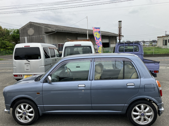 中古車 ダイハツ ミラジーノ 名変込み オールペン済 レザーシート の