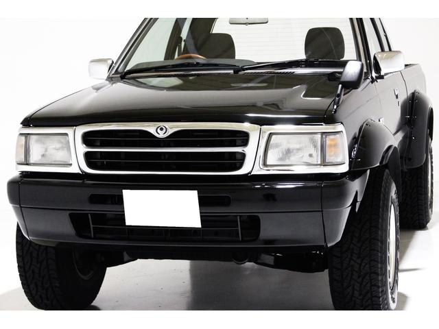 中古車 マツダ プロシード 2.6 キャブプラス 4WD キャブプラス 4WD リフトアップ ワイドオーバーフェンダー CD AUX の中古車詳細  (111,000km, ブラック, 群馬県, 186万円) | 中古車情報・中古車検索なら【車選びドットコム（車選び.com）】