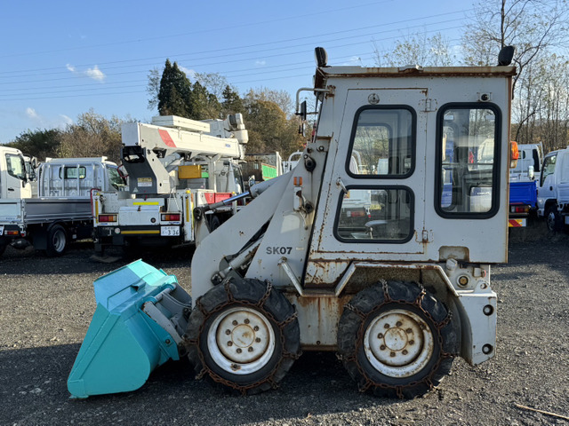 中古車 その他 コマツ コマツ SK07-3 バケット仕様 除雪 の中古車詳細 (走行距離不明, ホワイト, 青森県, 165万円) |  中古車情報・中古車検索なら【車選びドットコム（車選び.com）】