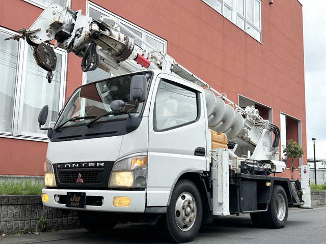 三菱ふそう キャンター 穴掘建柱車アイチD50A・抜柱機・水槽