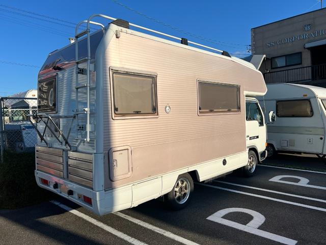 中古車 日産 アトラス キャンピング LAIKA キャンピングカー 8ナンバー の中古車詳細 (72,000km, ホワイト/ピンク, 愛媛県,  210万円) | 中古車情報・中古車検索なら【車選びドットコム（車選び.com）】