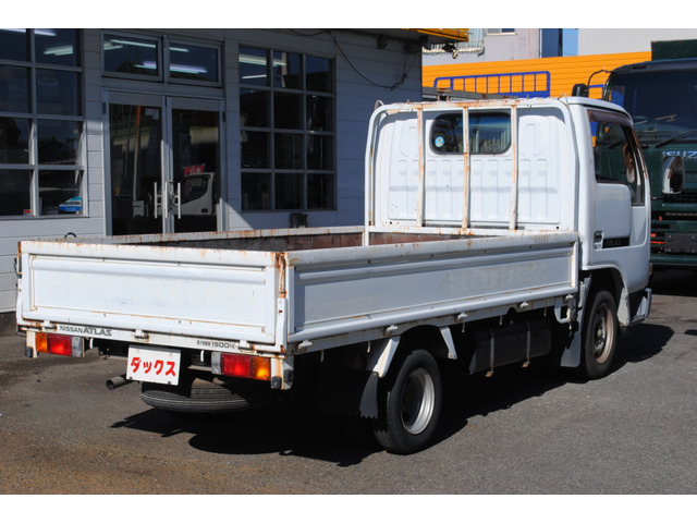 日産 アトラス 2.0 ロング DX 10尺平低床 3方開 1.5t AT車 の中古車