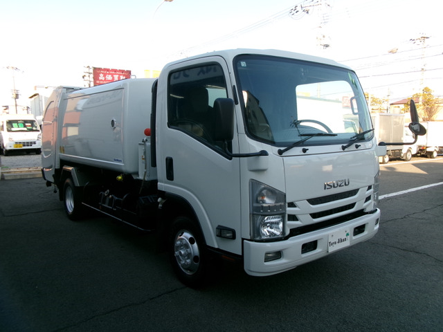 エルフ  4WDダンプ式塵芥車6.5M3新明和