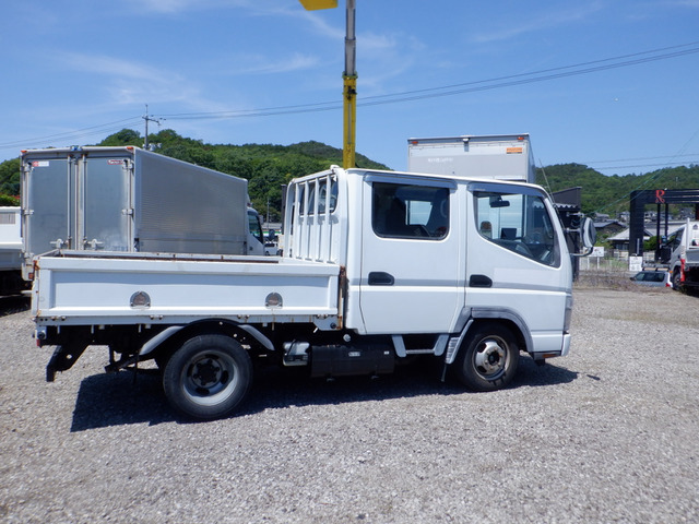 三菱ふそう キャンターガッツ 1.2t Wキャブ 5MT バックカメラ の中古車