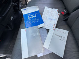 取扱説明書と点検記録簿です。整備記録が7枚あります。