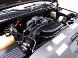 GMCユーコン デナリ カスタム車両の入庫!外装は迫力のマッドブラックにペイント済み(全塗装済)。ヘッドレストモニター、社外アンプ、ロックフォードウーハー、スピーカーなどオーディオカスタム