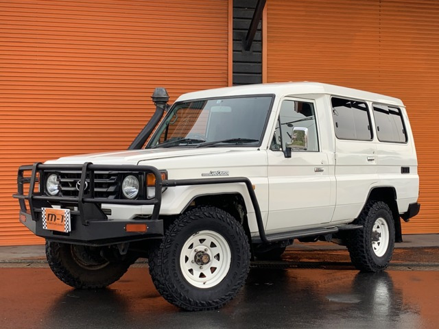 中古車 トヨタ ランドクルーザー 70トゥーループキャリア4 2l D Tb Ego H済tベルxx済ac付ps付 の中古車詳細 145 000km ホワイト 福岡県 548万円 中古車情報 中古車検索なら 車選びドットコム 車選び Com