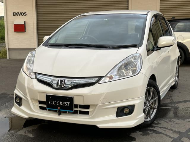 中古車 ホンダ フィットハイブリッド 1 3 の中古車詳細 173 000km パール 愛媛県 17万円 中古車情報 中古車検索なら 車選びドットコム 車選び Com