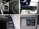 N-WGN各種スイッチ群です。ハンドル右下に、横滑り制御装置VSA、衝突軽減ブレーキCTBAのOFFスイッチがあります。オートヘッドライトやオートドアミラースイッチなども装着しております。