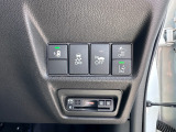 ホンダセンシング機能のボタンです。多彩な先進安全機能でより安全で快適なドライブを支援します。