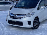 フリード 1.5 G ジャストセレクション 4WD 純正ナビ・バックカメラ・電動スライドドア