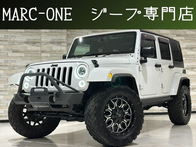 ラングラー アンリミテッド スポーツ 4WD 1年保証付 電動サイドステップ Bカメラ