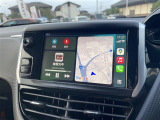 マットブラックにホワイトのLIBERALAのロゴの建物と看板が目印です。