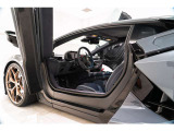 Floor mats with leather border and double stitching