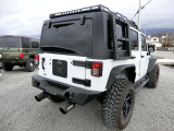カスタム多数でかっこよく決まったJEEPラングラーの入庫です!2.5インチリフトUP・ギブソンマフラー・BALLISTC18インチAW・社外前後バンパー・社外サイドステップ・社外ルーフキャリア!