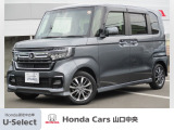 シャイニンググレー・メタリックのN-BOX カスタム Lです。Honda SENSINGを搭載しています。運転席と助手席にはシートヒーターが装備されています。