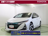 先進的なフロントマスクの【プリウスPHV】4人乗り。モデリスタフルエアロで精悍なスタイルです。コンセントから充電して走ることも、ガソリンで走ることもできます。この車は、車検整備付きです。