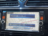 ナビ画面のアップ写真です。フルセグTV・Bluetoothオーディオ・CD・DVDビデオ再生が可能です。