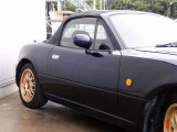 人気のユーノスロードスターカスタム車両の入庫!走行10万km時にはタイミングベルト一式に加え、各ベルト、ラックピニオンブーツ、角シーツも交換済!TEIN車高調、BBS製RG-F15AW等充実装備の一台