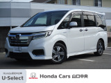 ステップワゴン SPADA HYBRID G EX Honda SENSINGです。ボディカラーはプラチナホワイト・パール。縦にも横にも開く、わくわくゲート搭載。リア席モニターを装備しています。
