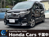 黒色のステップワゴン スパーダHYBRID G EXホンダセンシングが入庫しました。純正ナビ、全周囲カメラ装備のお車です。