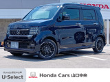 ミッドナイトブルービーム・メタリックのN-WGN カスタム L・ターボです。パドルシフト付きのターボ車になります。9灯式フルLEDヘッドライトを装備した顔つきが特徴的です。
