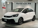 全国納車可 第三者機関証明書付 H SENSING 新車保証 試乗車 ワンオーナー ナビLXM-242ZFNi TV Rカメラ BTオ-ディオ ETC LEDライト装備のフィット e:HEVRS入庫