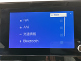 ラジオや音楽、Bluetooth接続など、多彩な音源を楽しめます。操作も簡単で、快適なドライブを演出します。お好みの音量や音質で、ドライブを彩りましょう。