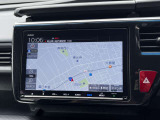 ナビ画面のアップ写真です。フルセグTV・Bluetoothオーディオ・ミュージックラック・CD・DVDビデオ再生が可能です。