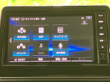 多彩な機能を備えたナビゲーションシステムで、目的地設定や情報検索がスムーズに行えます。快適なカーライフをサポートする頼れる相棒です。