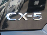 【CX-5】上質感と精悍さを兼ね備え、ワイド感を強調した意匠。オールラウンドな機能美と品格、洗練されたデザイン。
