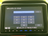 画面にはセキュリティコード入力の案内が表示され、数字キーと訂正・決定の表示を確認できます。下部にはオーディオや現在地、メニューなどの項目が並びます。