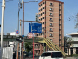豊中・江坂方面へ右折の道路標識が出てくるので