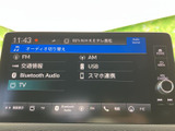 お好みの音楽をクリアな音質で楽しめるオーディオシステムです。ラジオ、CD、USBなど、様々なメディアに対応しており、車内空間を快適に変えます。