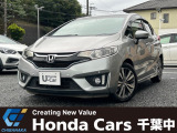 銀色のフィット ハイブリッドSパッケージが入庫しました。純正ナビ、バックカメラ装備のお車です。