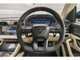 Sport Steering Wheel in Full Corsa Tex with Dark chrome Bezel and Red Marker, heated