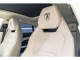 Embroidered Lamborghini shield on headrest