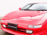 人気のMR2カスタム車両の入庫!全国でも台数の少ないATモデルをベースに外装同色塗装、RAYS製TE37SL15AW、ローダウン、バックカメラなどの充実装備にタイヤもADVANを装着。溝も9分山有