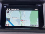 地図上に周辺の道路や施設が表示され、現在地周辺を確認しやすい画面です。縮尺表示もあり、目的地までのルート確認や慣れない場所へのお出かけに役立ちます。