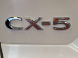【CX-5】上質感と精悍さを兼ね備え、ワイド感を強調した意匠。オールラウンドな機能美と品格、洗練されたデザイン。